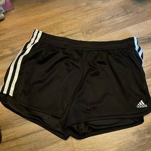 Black women’s medium adidas shorts.